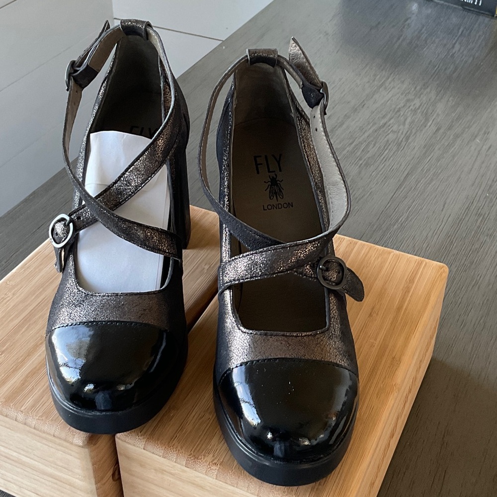 Fly London Women's Metallic and Black Heels size 7.